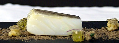 Cod marinated in ember oil, black olive earth and stones, oil and cod crystals sweets, smoothly roasted garlic, chili and purple cabbage sprouts. Cod1 | 8th Cooking with EVOO Competition in Alicante | whats cooking with olive oil extra virgin olive oil competitions